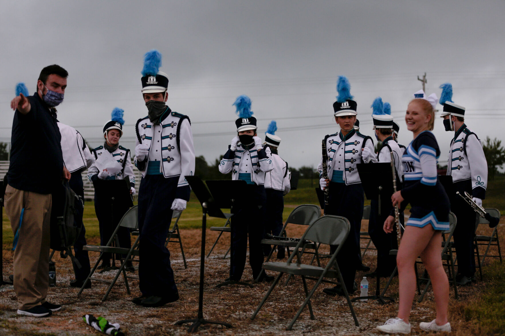 Tolton Catholic High School’s marching band sets up for its pregame performance